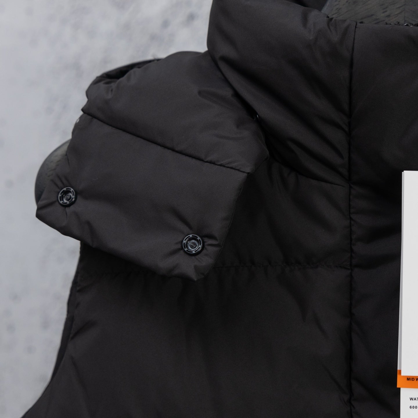 Ralph Lauren black puffer jacket sleeve and shoulder with metal button
