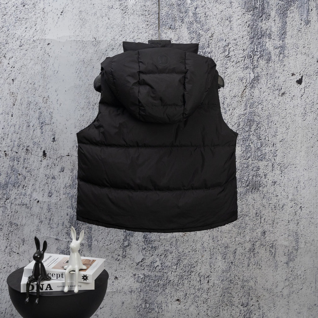 Black hooded puffer vest with front pockets and zip