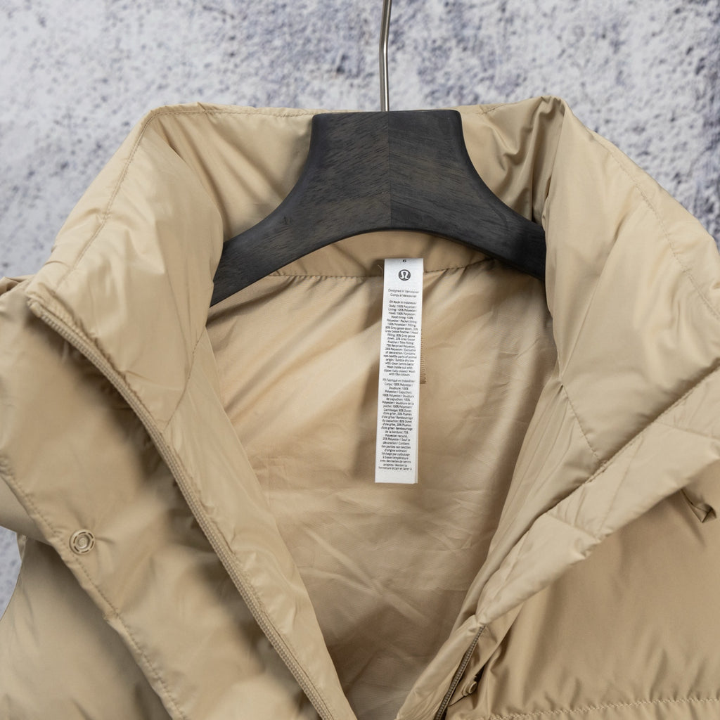 Beige puffer jacket interior view with inner lining and center placket