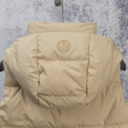 Tan hooded puffer jacket back view with embossed logo