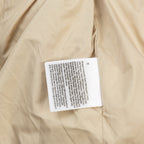 Ralph Lauren tan puffer jacket with care label on inside lining