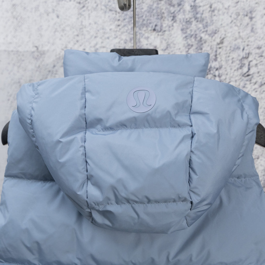 Light blue hooded puffer vest with circular RL logo on front