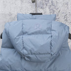 Light blue hooded puffer vest with circular RL logo on front