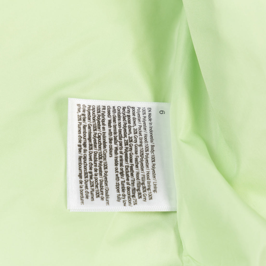 Ralph Lauren lime green puffer vest care label on fabric
