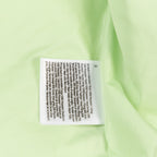 Ralph Lauren lime green puffer vest care label on fabric