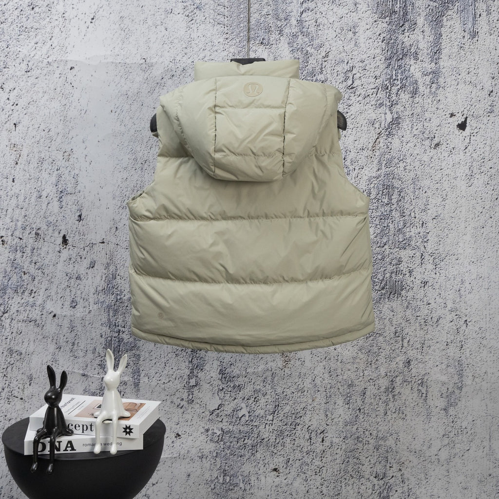 Light green sleeveless puffer vest with hood and front pockets