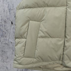Light sage puffer vest quilted square patch and stitched panel seams
