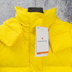 Yellow puffer jacket with hood and buttoned collar, hang tags