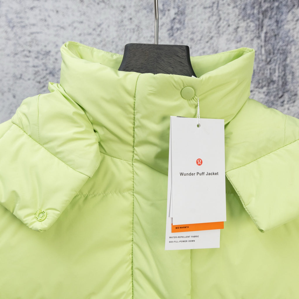 Lime green puffer jacket with buttoned high collar and hanging product tag