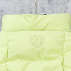 Light green hooded puffer jacket with circular chest logo