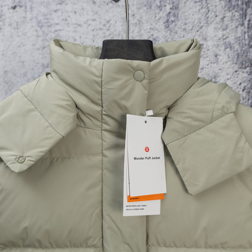 Light olive hooded puffer jacket with front button and sleeve tabs