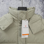 Light olive hooded puffer jacket with front button and sleeve tabs