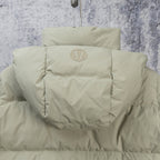 Beige hooded puffer jacket with back logo and quilted shoulder panels