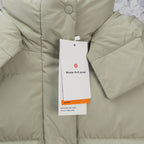 Light olive hooded puffer jacket with button placket and hanging product tag