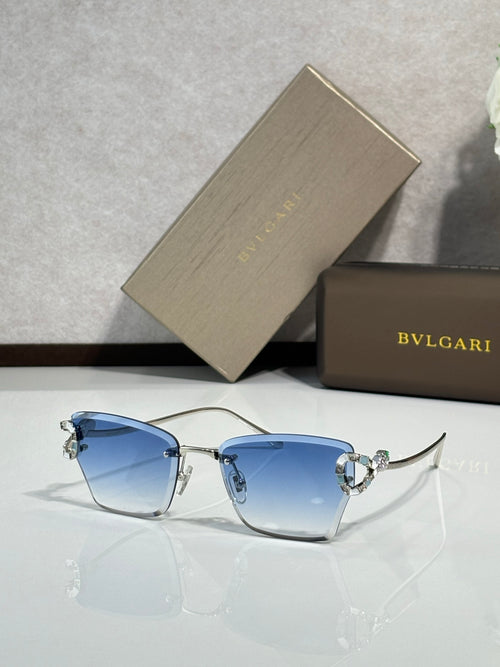 Bvlgari eyeglasses with blue tinted lenses and gold-tone frame