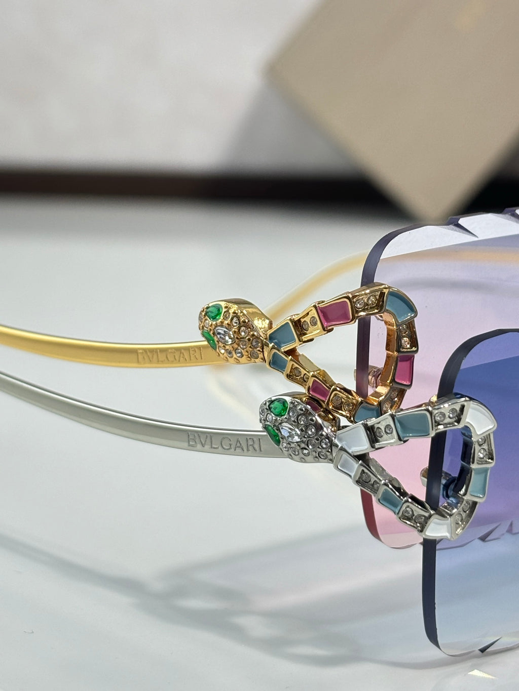 Bvlgari sunglasses close-up: gem-encrusted temple with multicolor colored stones