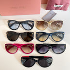 MiuMiu sunglasses assortment with six cat-eye frames in black, blue, tan, pink.