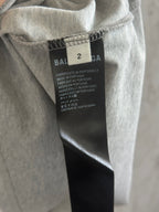 Gray T-shirt neck tag with size 2 and Balenciaga branding