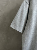 Gray T-shirt sleeve detail, short cuff and side seam