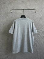 Gray short-sleeve T-shirt on hanger, front view