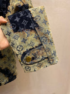 Light green patchwork cuff detail on navy Louis Vuitton monogram jacket