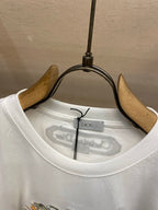 White T-shirt neckline with Dior size and care label inside the collar