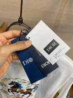 White T-shirt with attached Dior garment tags