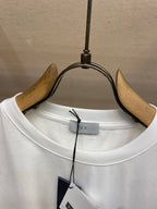 White Christian Dior T-shirt neckline and collar with hanging tag