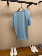 Light blue Gucci crew-neck T-shirt back view with hanging tag