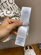 Louis Vuitton T-shirt with white care label on inside seam