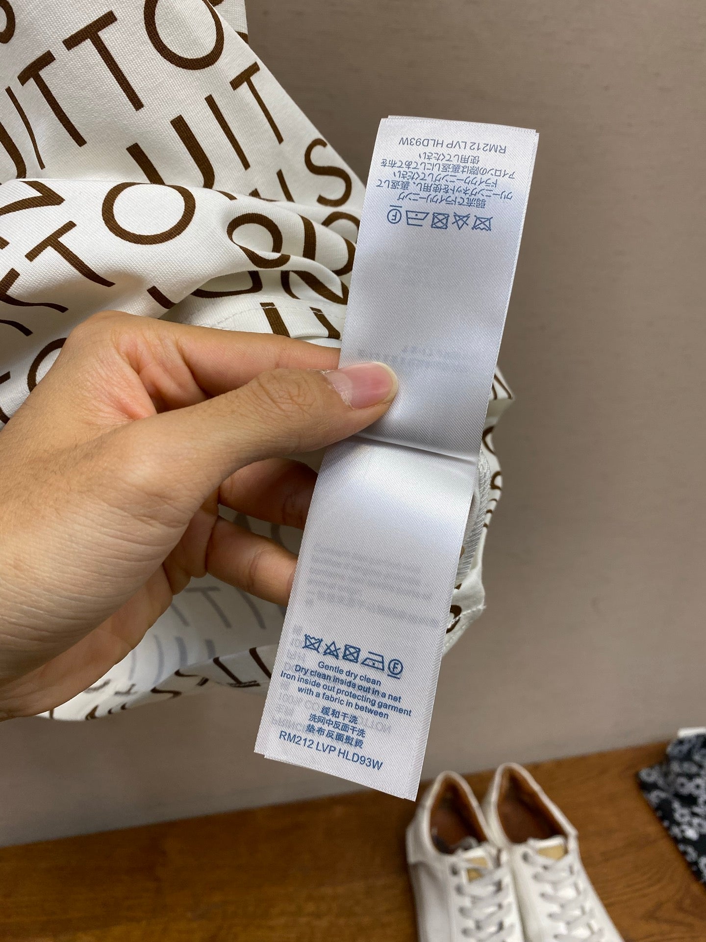 Louis Vuitton T-shirt with white care label on inside seam