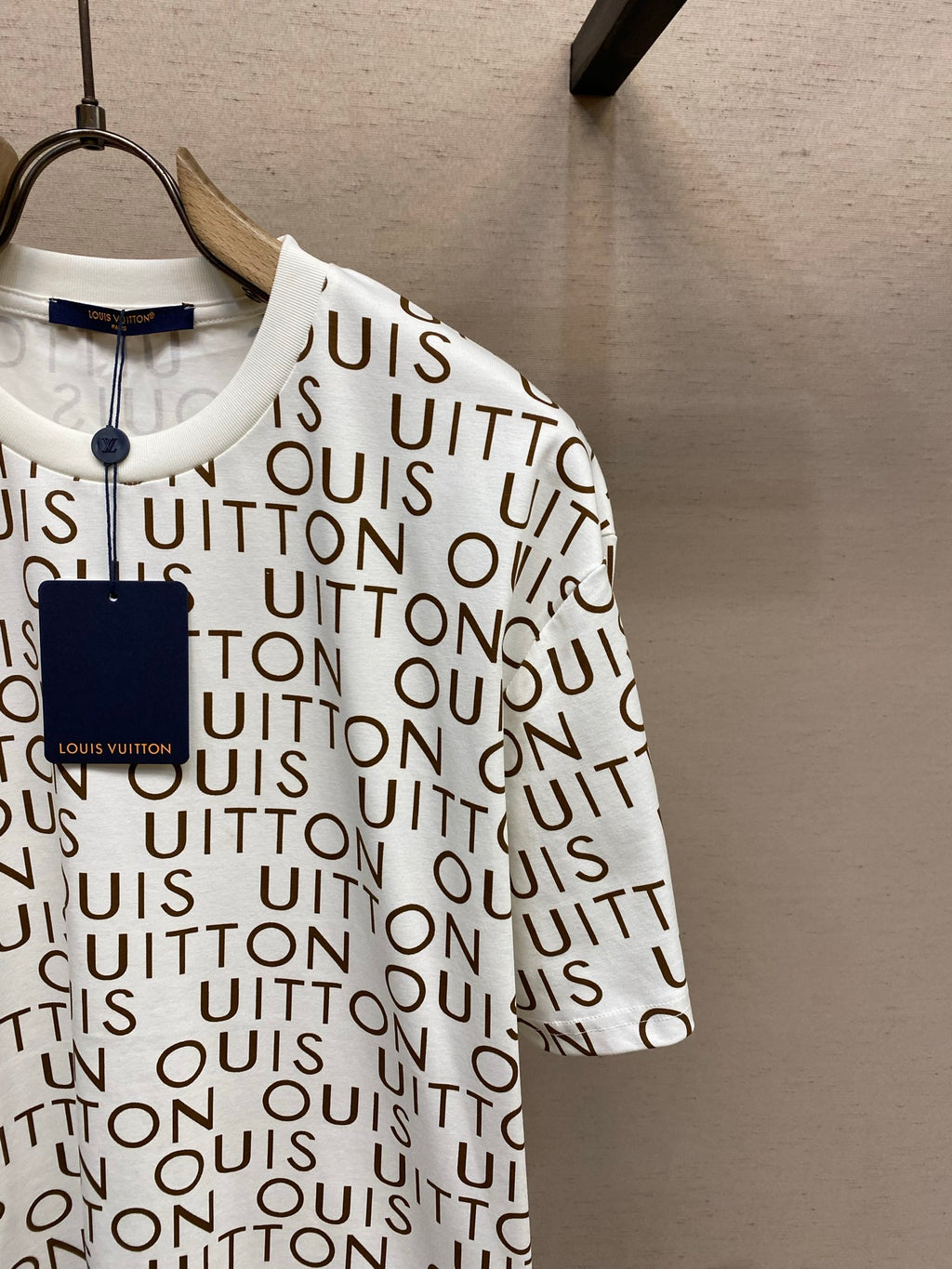 Louis Vuitton logo T-shirt with navy hang tag, white with brown monogram print