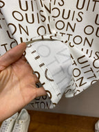 Louis Vuitton monogram T-shirt fabric detail, white with brown logo print
