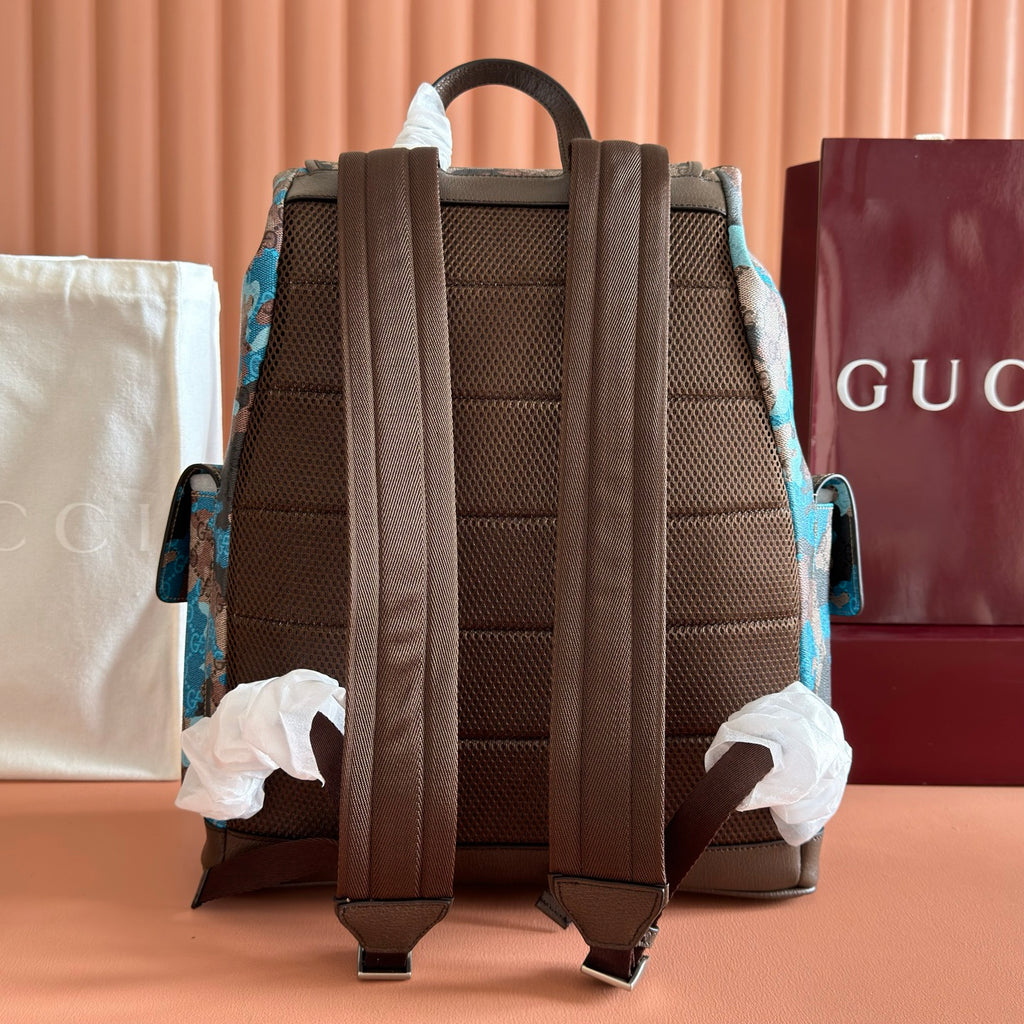 Gucci camo-print backpack with padded mesh back panels and adjustable brown shoulder straps