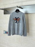 Gray knit sweater with crew neck and colorful cartoon-style LV graphic on front