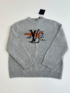Gray knit sweater front with crew neck and LV-style cartoon graphic