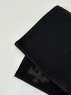 Black shorts with embroidered lower side graphic detail