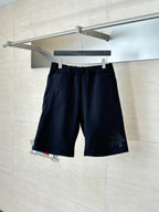 Navy drawstring shorts with elastic waistband and small embroidered side logo