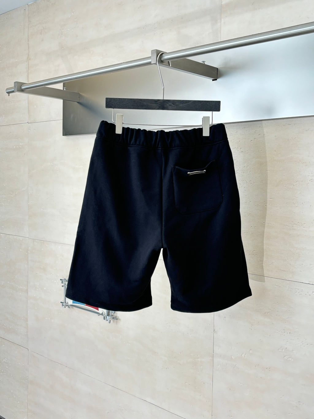 Navy casual shorts with elastic waist and zippered side pocket detail