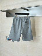 Heather gray shorts with elastic drawstring waist and small black logo at pocket