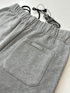 Heather gray shorts with front patch pocket and rectangular brand label
