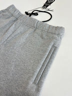 Heather gray shorts with elastic waistband and front seam with side pocket detail