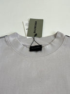 Light gray crewneck top with BALENCIAGA logo neck label