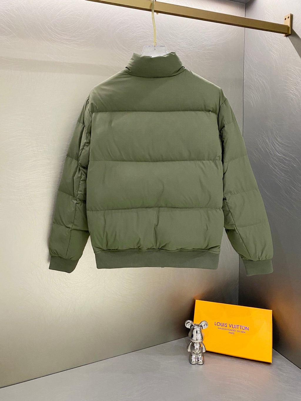 Light green Ralph Lauren puffer jacket back view with quilted panels