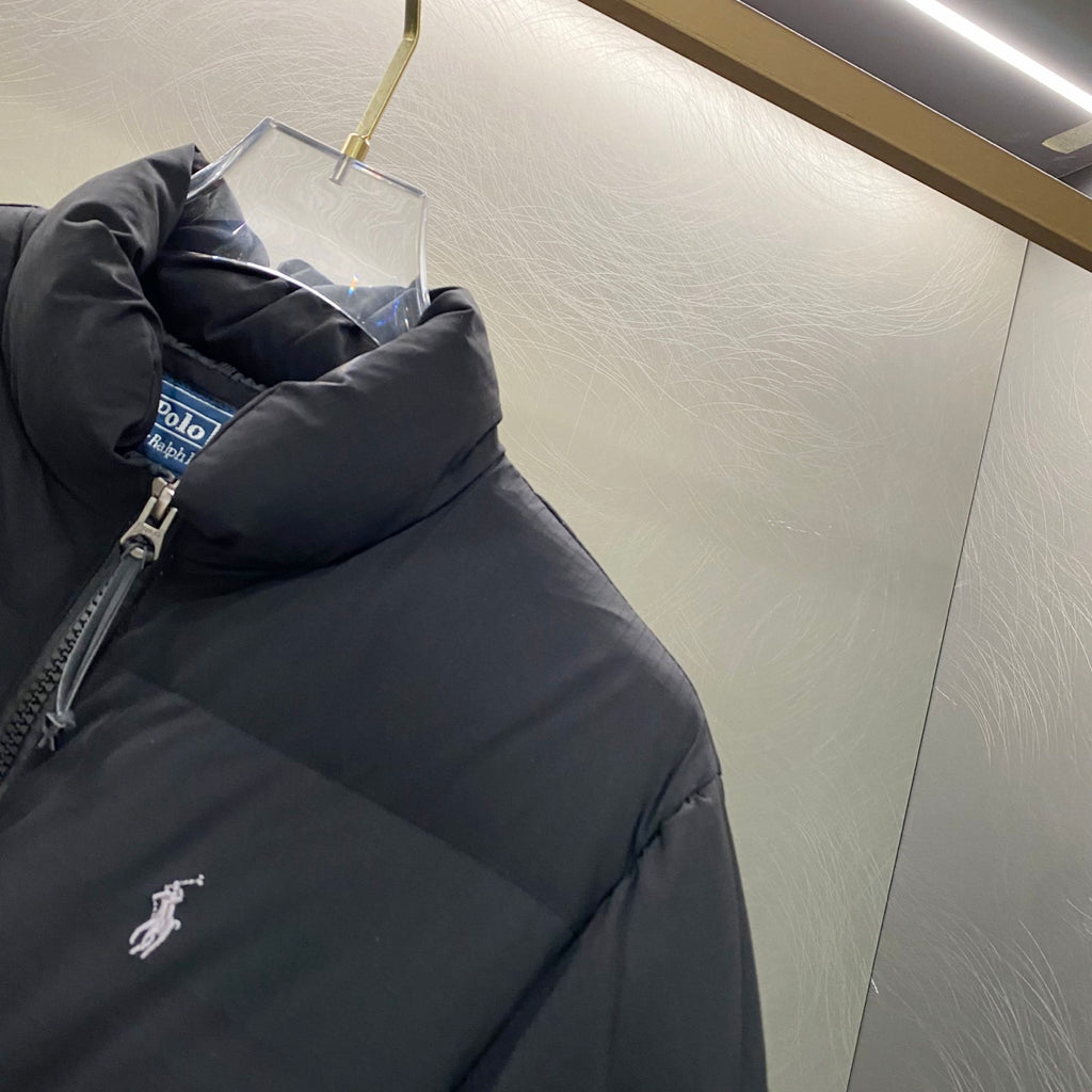 Black Ralph Lauren puffer jacket shoulder and zipper close-up