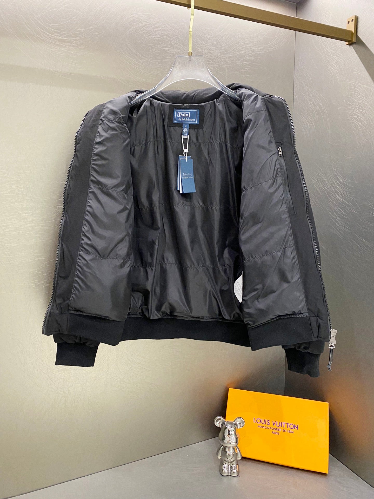 Dark gray Ralph Lauren puffer jacket open view with zipper and logo