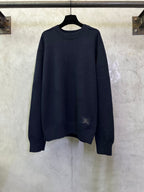 Navy long-sleeve crewneck sweater with ribbed hem and cuffs