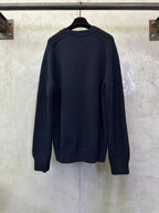 Navy back view long-sleeve crewneck sweater with ribbed collar and cuffs
