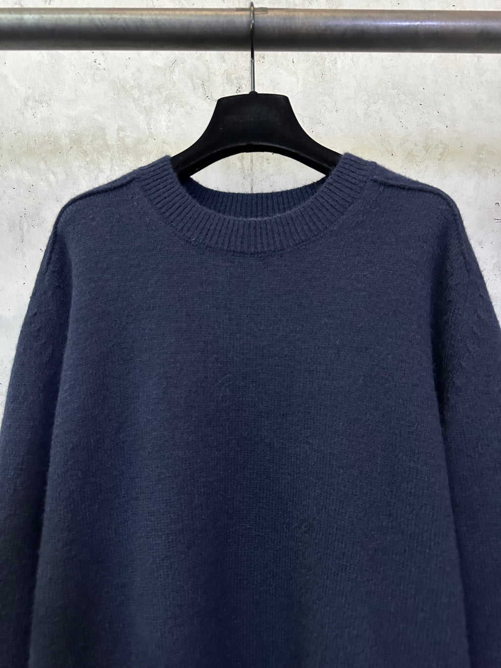 Navy crewneck knit sweater with ribbed neckline