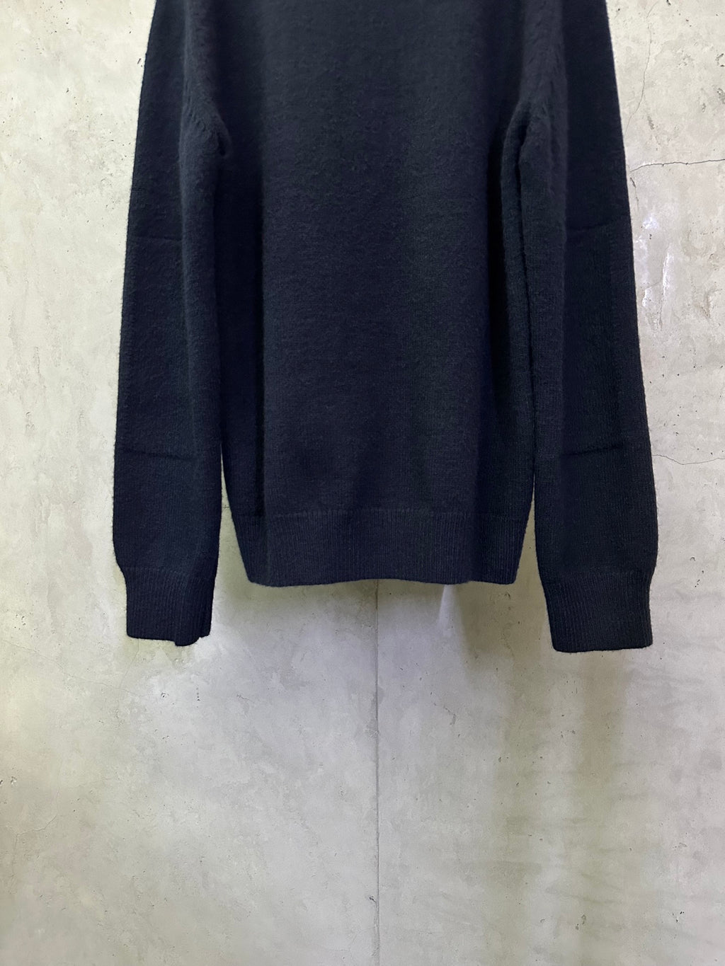 Navy long-sleeve crewneck sweater back with ribbed cuffs